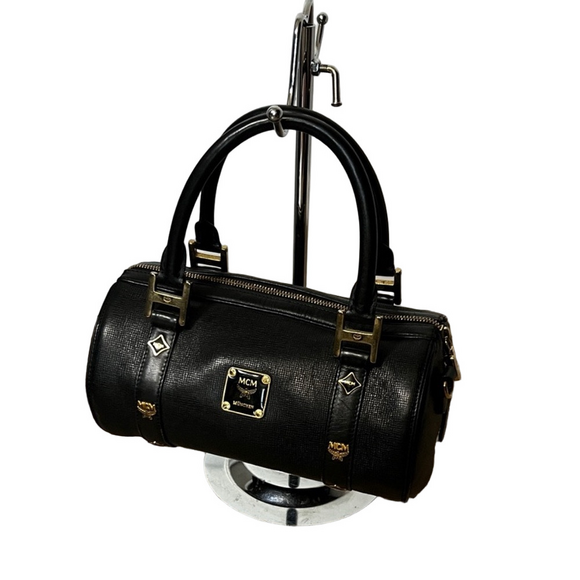 MCM Handbags - MCM Black Barrel Bag with Gold Details